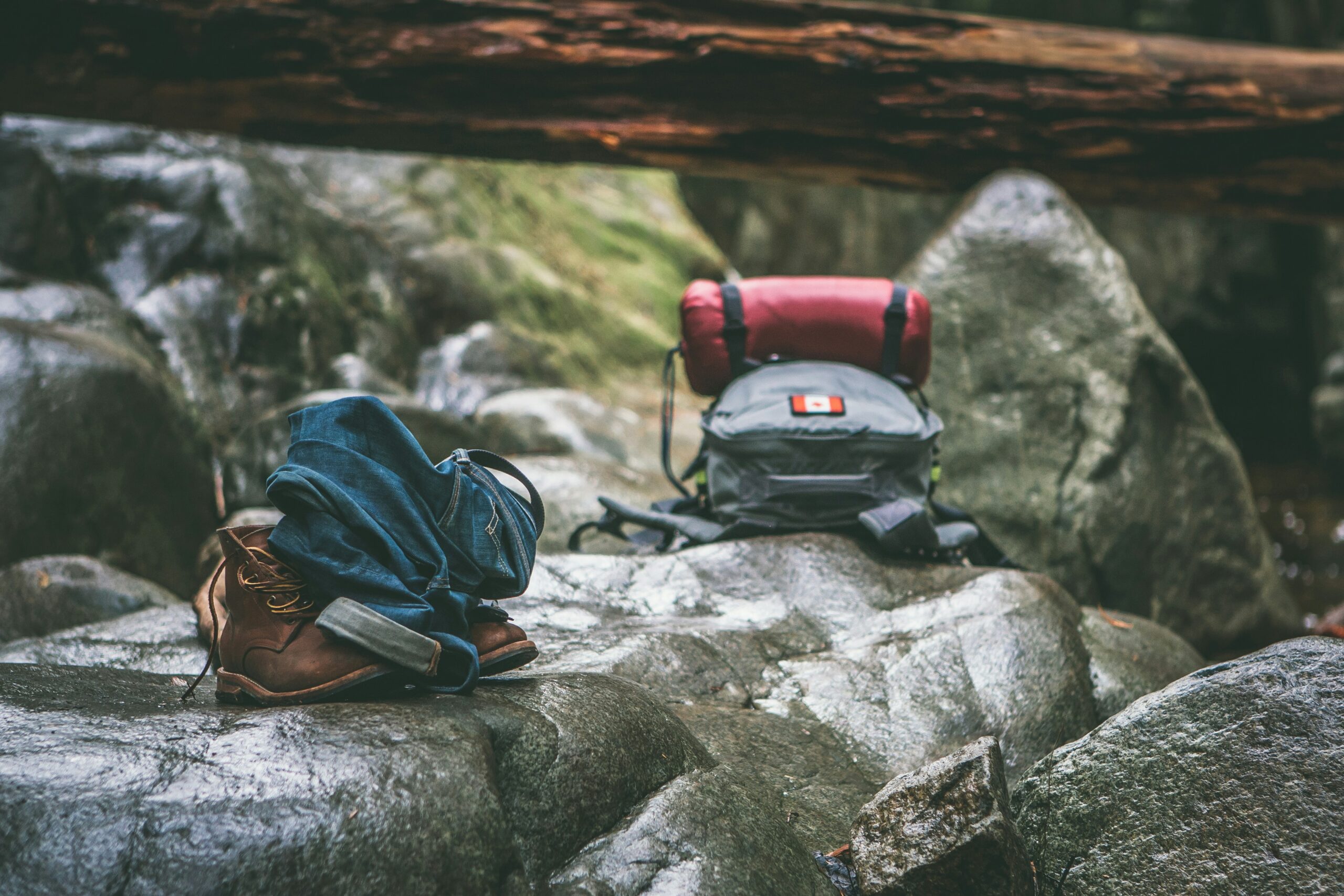 Two backpacks on stones